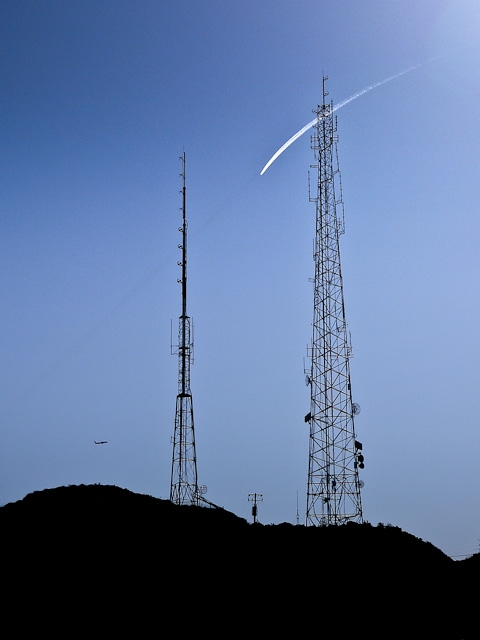planes sky contrail radio towers